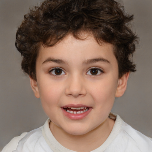 Joyful white child male with medium  brown hair and brown eyes