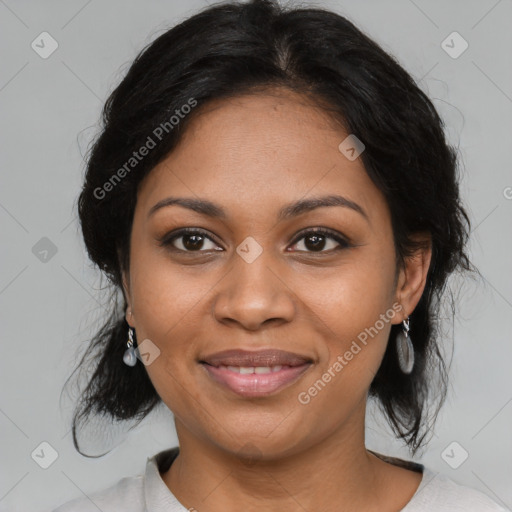 Joyful black young-adult female with medium  black hair and brown eyes