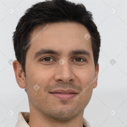 Joyful white young-adult male with short  brown hair and brown eyes