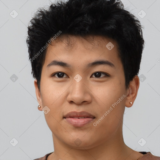 Joyful asian young-adult male with short  black hair and brown eyes