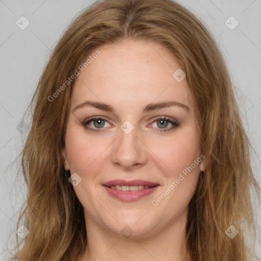 Joyful white young-adult female with long  brown hair and green eyes