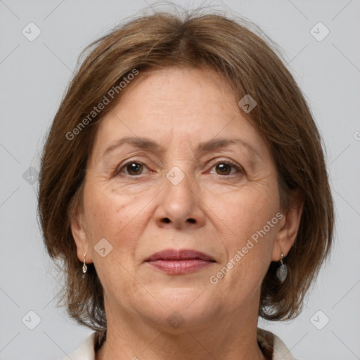 Joyful white adult female with medium  brown hair and grey eyes