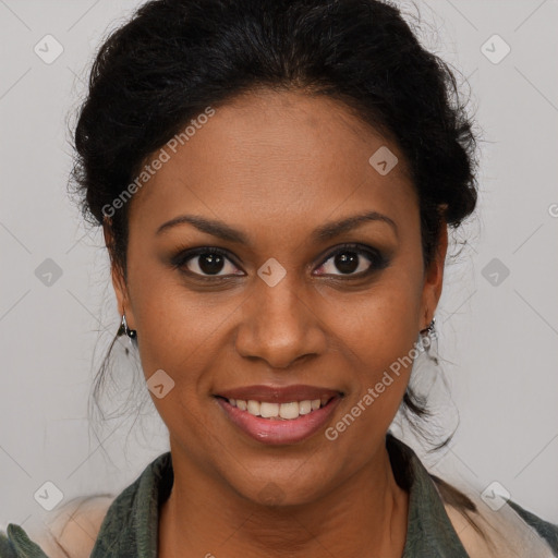 Joyful black young-adult female with long  brown hair and brown eyes