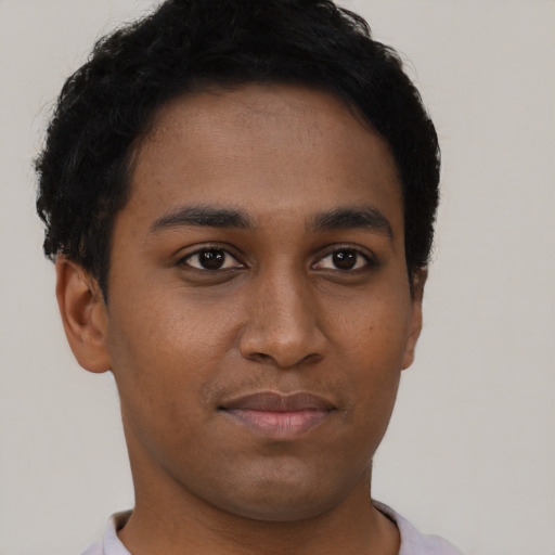 Neutral black young-adult male with short  brown hair and brown eyes