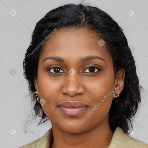 Joyful black young-adult female with medium  brown hair and brown eyes