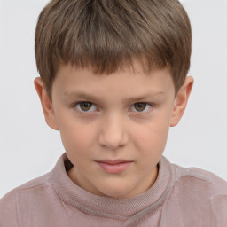 Neutral white child male with short  brown hair and brown eyes