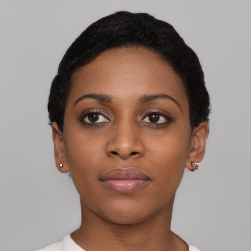Neutral black young-adult female with short  black hair and brown eyes