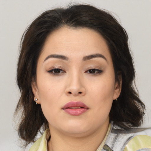 Neutral asian young-adult female with medium  brown hair and brown eyes