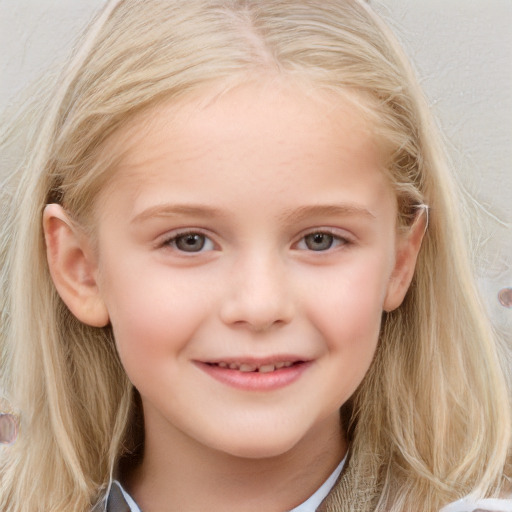 Joyful white child female with long  brown hair and blue eyes