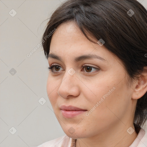 Neutral white young-adult female with medium  brown hair and brown eyes