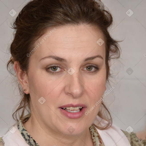 Joyful white adult female with medium  brown hair and blue eyes