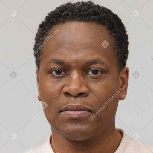 Neutral black adult male with short  black hair and brown eyes