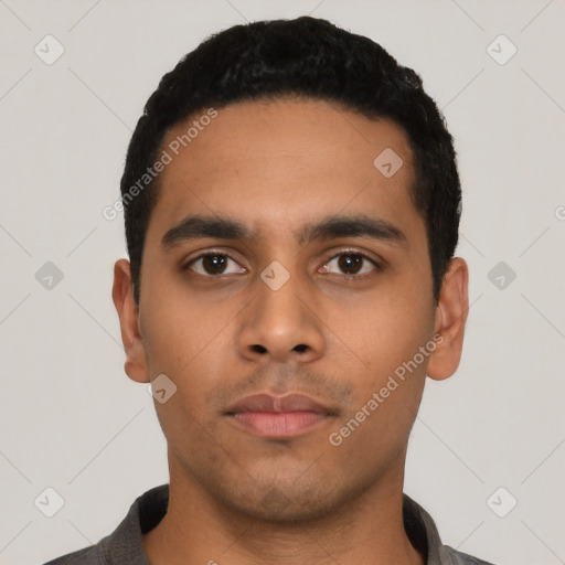 Neutral latino young-adult male with short  black hair and brown eyes