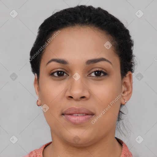 Joyful latino young-adult female with short  brown hair and brown eyes