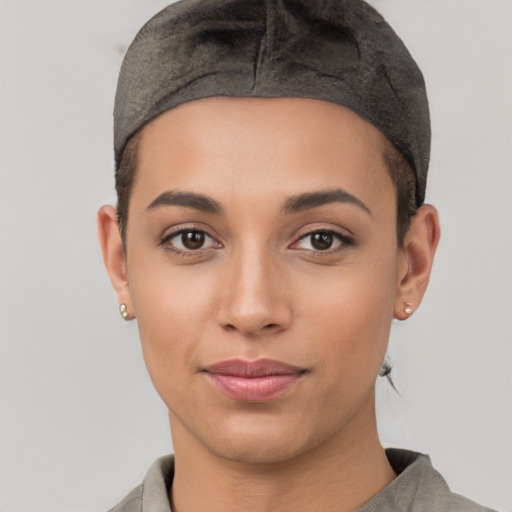 Joyful white young-adult female with short  black hair and brown eyes