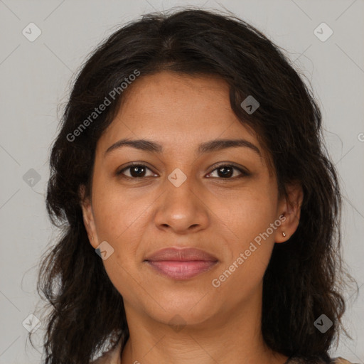 Joyful black young-adult female with long  brown hair and brown eyes