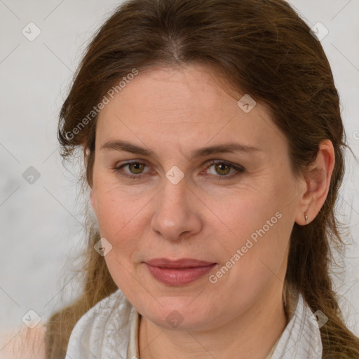 Joyful white adult female with medium  brown hair and brown eyes