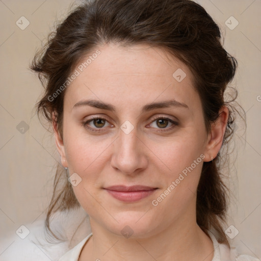 Joyful white young-adult female with medium  brown hair and green eyes