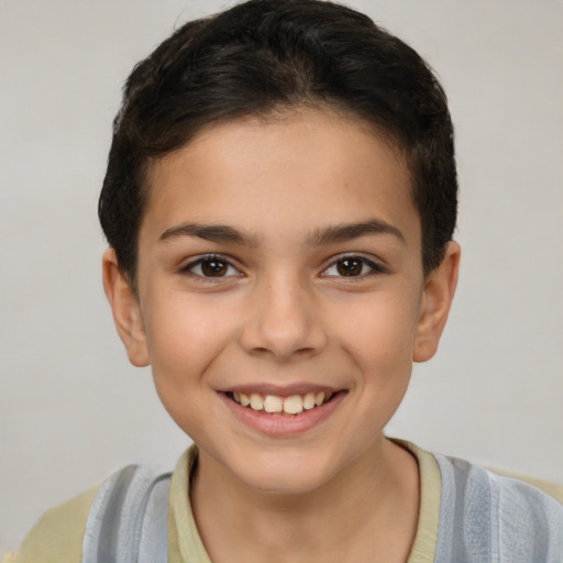 Joyful white child female with short  brown hair and brown eyes