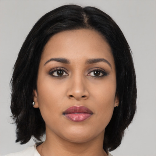 Neutral asian young-adult female with medium  black hair and brown eyes