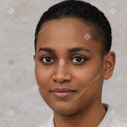 Joyful black young-adult female with short  black hair and brown eyes