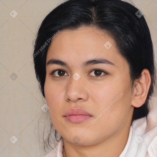 Joyful latino young-adult female with medium  black hair and brown eyes