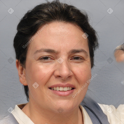 Joyful white adult female with short  brown hair and brown eyes