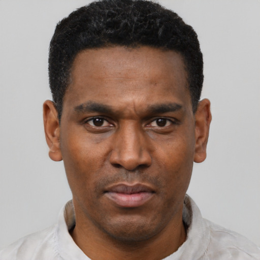 Neutral black young-adult male with short  black hair and brown eyes