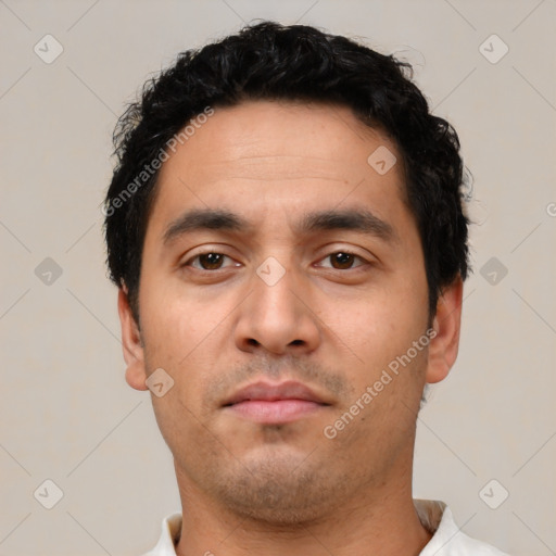 Neutral latino young-adult male with short  black hair and brown eyes