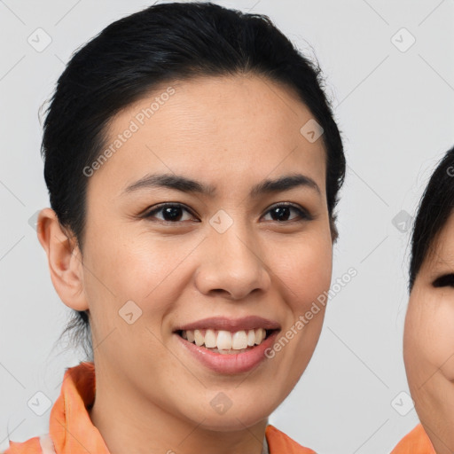 Joyful asian young-adult female with medium  brown hair and brown eyes