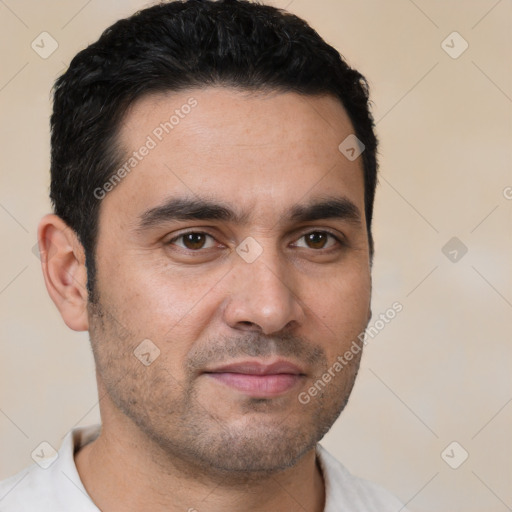 Joyful white young-adult male with short  black hair and brown eyes