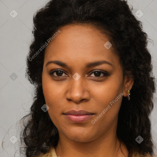 Joyful black young-adult female with long  brown hair and brown eyes