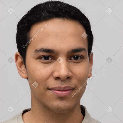 Joyful latino young-adult male with short  brown hair and brown eyes