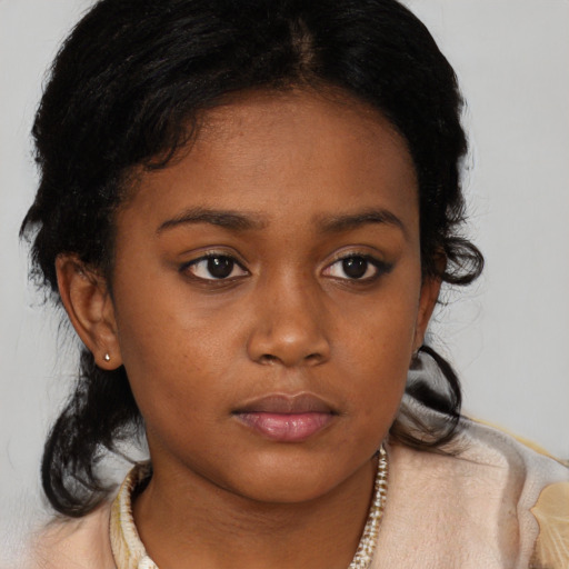 Neutral black young-adult female with medium  black hair and brown eyes