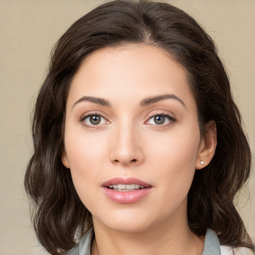 Neutral white young-adult female with medium  brown hair and brown eyes