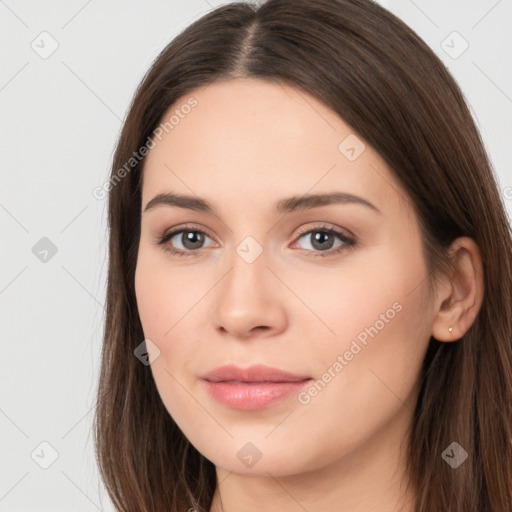 Neutral white young-adult female with long  brown hair and brown eyes