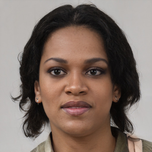 Neutral black young-adult female with medium  black hair and brown eyes