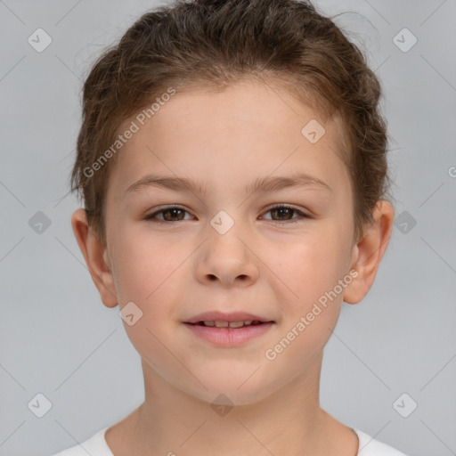 Joyful white child female with short  brown hair and brown eyes