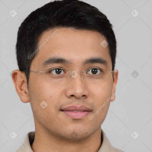 Joyful asian young-adult male with short  brown hair and brown eyes