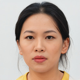 Neutral asian young-adult female with medium  brown hair and brown eyes