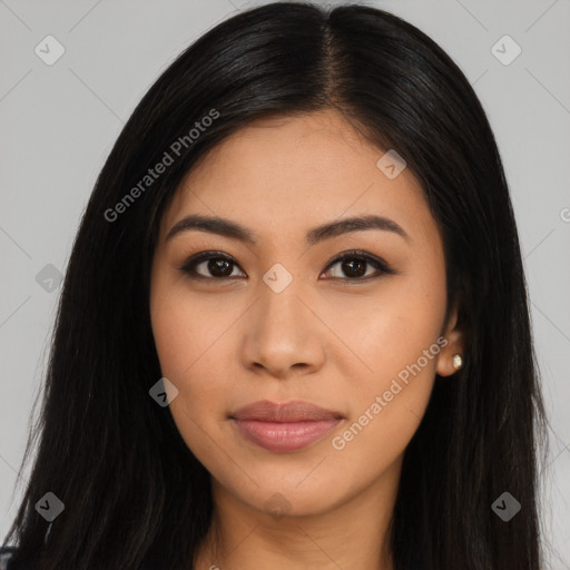 Joyful latino young-adult female with long  black hair and brown eyes