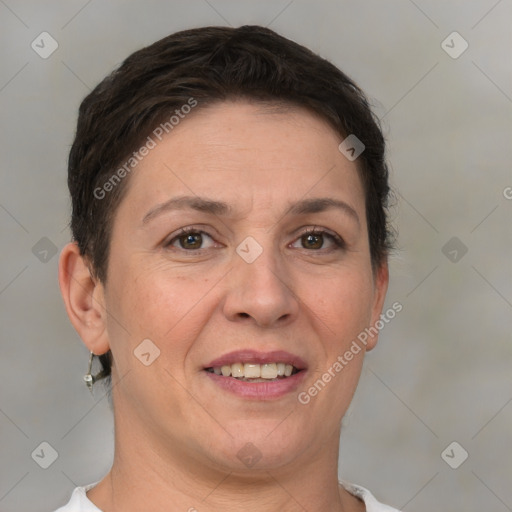 Joyful white adult female with short  brown hair and brown eyes