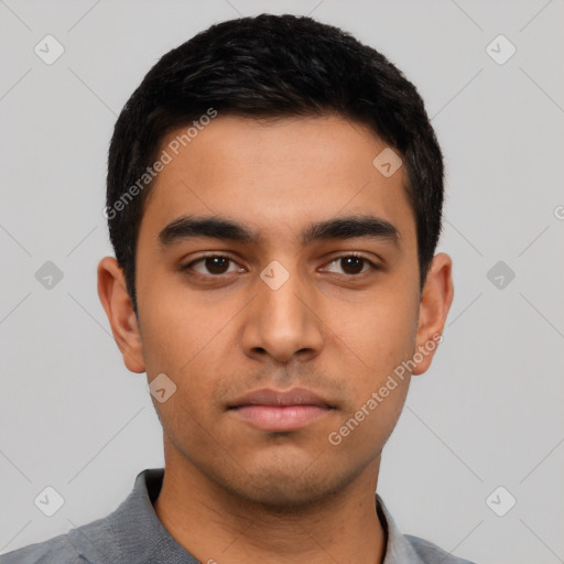 Neutral latino young-adult male with short  black hair and brown eyes