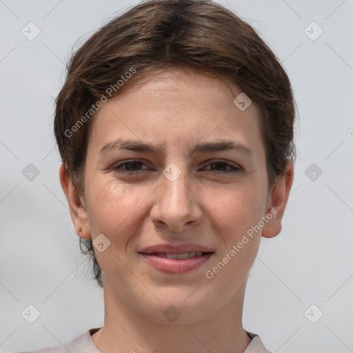 Joyful white young-adult female with short  brown hair and brown eyes