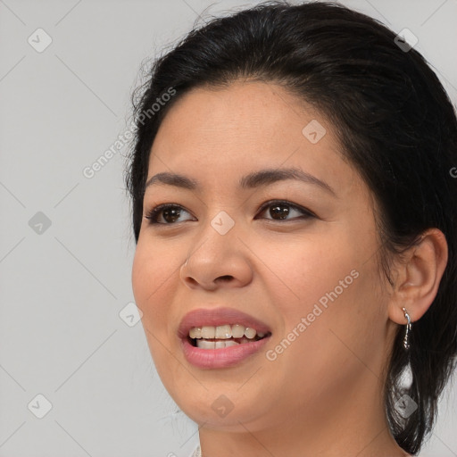 Joyful asian young-adult female with medium  black hair and brown eyes