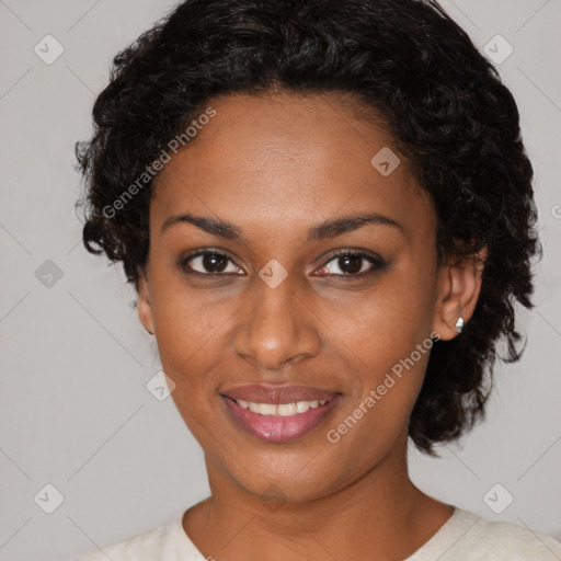 Joyful black young-adult female with short  black hair and brown eyes