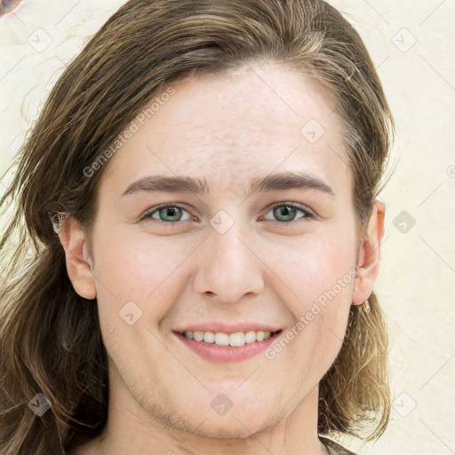 Joyful white young-adult female with long  brown hair and green eyes