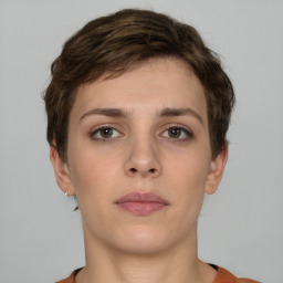 Neutral white young-adult female with short  brown hair and brown eyes