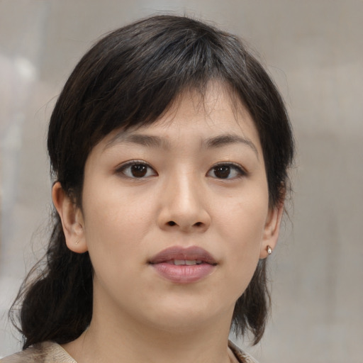 Neutral asian young-adult female with medium  brown hair and brown eyes