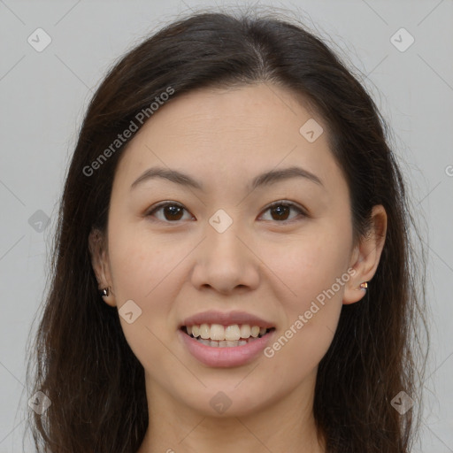 Joyful white young-adult female with long  brown hair and brown eyes